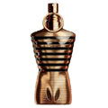 A bottle of Le Male Elixir Eau de Parfum by Jean Paul Gaultier, featuring a gold and brown color scheme with a design that resembles a male torso.