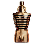 A bottle of Le Male Elixir Eau de Parfum by Jean Paul Gaultier, featuring a gold and brown color scheme with a design that resembles a male torso.