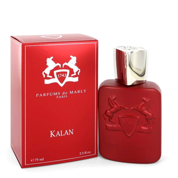 A red bottle of Kalan Eau de Parfum by Parfums De Marly with a silver cap, alongside its red box displaying the brand and product name.