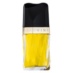 Perfume bottle with black cap and yellow body on a white background