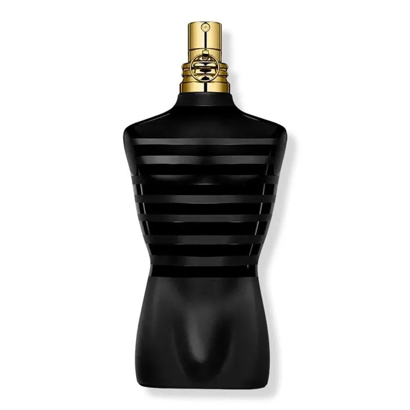 A black bottle of Le Male Le Parfum by Jean Paul Gaultier with a gold cap, designed in the shape of a male torso.