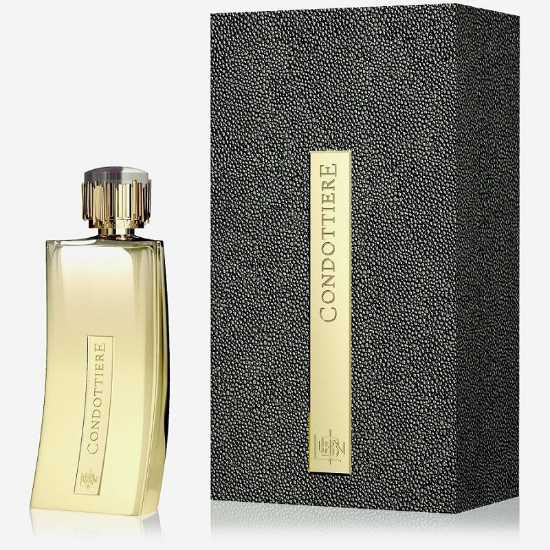 Gold perfume bottle with black textured packaging