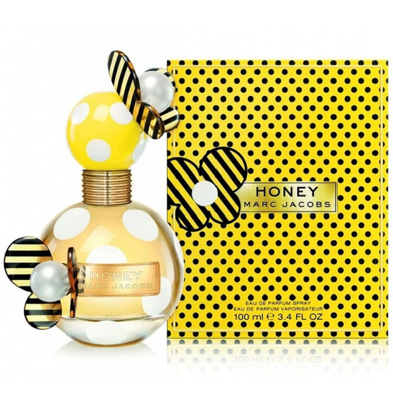 Marc Jacobs Honey perfume bottle and packaging with a yellow and black design.