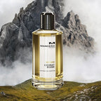Mancera perfume bottle with mountainous landscape in the background