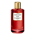 A red glass bottle of Cherry Cherry Eau de Parfum by Mancera with a gold cap.