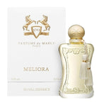 A bottle of Meliora Royal Essence Eau de Parfum by Parfums De Marly with a decorative box. The bottle is clear with a gold cap and a white label featuring the name 'Meliora' and the scent 'Royal Essence'.