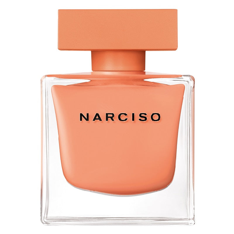 Narciso perfume bottle with peach-colored cap and body on a white background