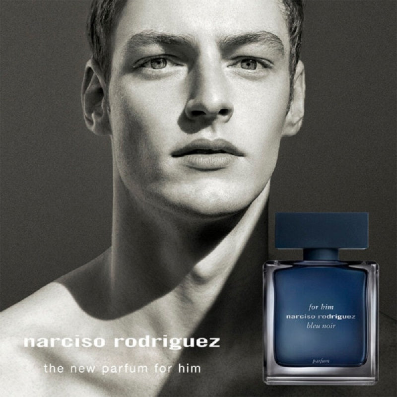 Advertisement for Narciso Rodriguez perfume with a man and a perfume bottle.