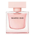 A glass bottle of Narciso Cristal Eau De Parfum by Narciso Rodriguez with a pink liquid and a square pink cap.
