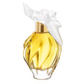 A bottle of L'Air Du Temps Eau de Toilette by Nina Ricci with a clear, golden yellow liquid visible and a white floral decoration on the top.