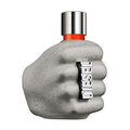 Concrete hand-shaped Diesel perfume bottle on a white background