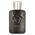Black perfume bottle with silver cap on a white background