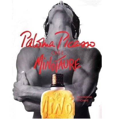 Advertisement for Paloma Picasso Minotaure perfume with a shirtless man holding a yellow perfume bottle.