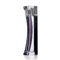 Clear perfume bottle with a purple liquid on a white background