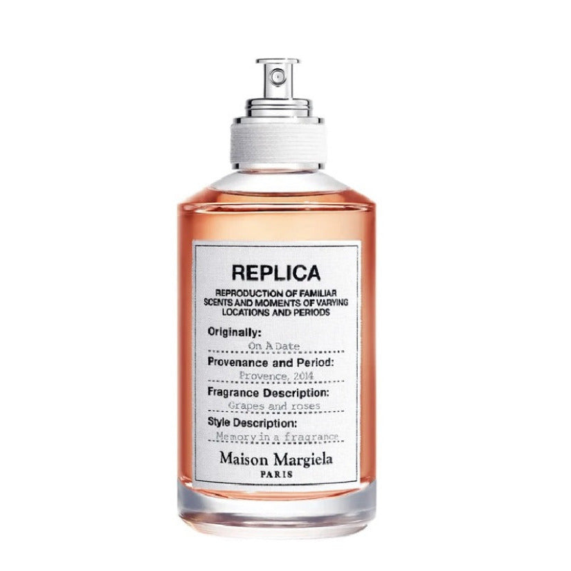 A spray bottle of Maison Margiela Replica fragrance, labeled 'On A Date', with a capacity of 100ml.