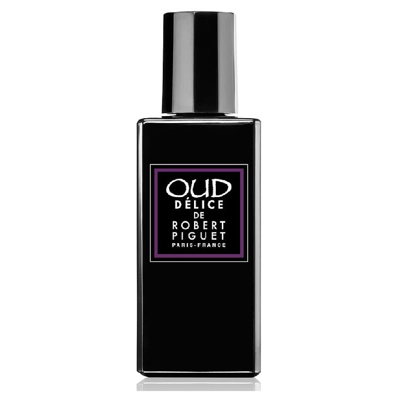 Black perfume bottle with 'Oud Delice de Robert Piguet' label on a white background