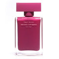 Pink perfume bottle labeled 'fleur musc' by Narciso Rodriguez on a white background
