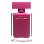 Pink perfume bottle labeled 'fleur musc' by Narciso Rodriguez on a white background