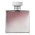 A bottle of Romance Parfum Eau De Parfum by Ralph Lauren with a gradient of purple to clear, labeled with the product name.