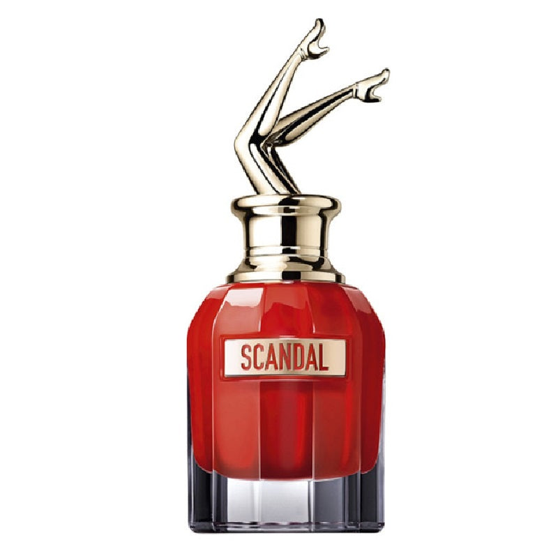 Red perfume bottle with gold cap and 'Scandal' branding on a white background