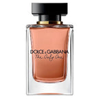 A glass bottle of Dolce & Gabbana The Only One Eau de Parfum with a pink-tinted liquid visible and the brand name displayed on the label.