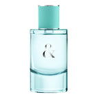 Perfume bottle with a light blue cap and body on a white background