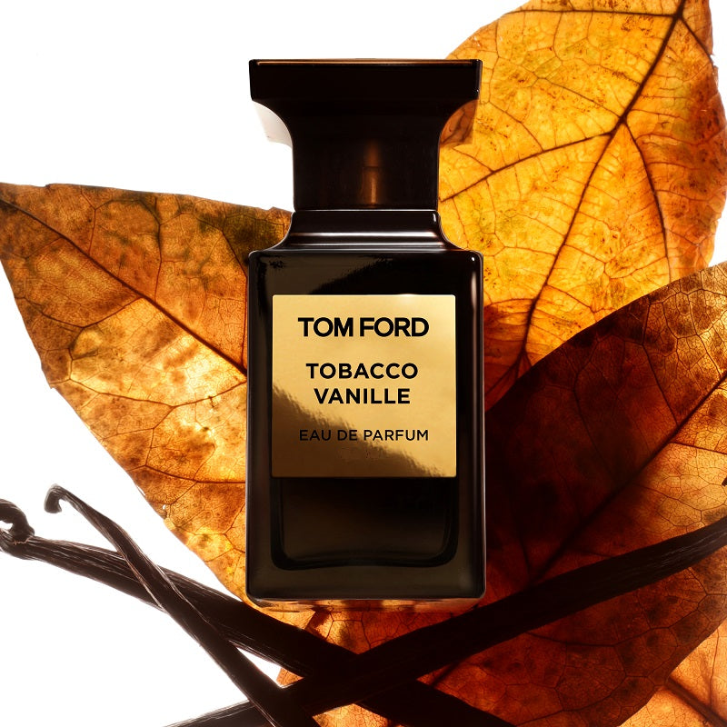 Tom Ford Tobacco Vanille perfume bottle on a leafy background