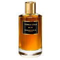 A glass bottle of Tonka Cola Eau de Parfum by Mancera with a gold-colored cap and a dark amber liquid visible.