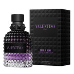 Valentino Uomo Born in Roma Purple Melanclolia perfume bottle and packaging on a white background