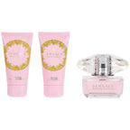 Versace Bright Crystal perfume set with two body lotions on a white background