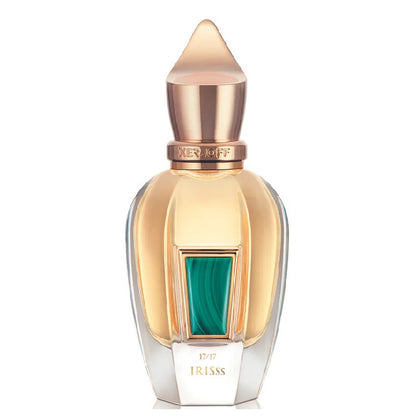 Gold and clear perfume bottle with green accent on a white background
