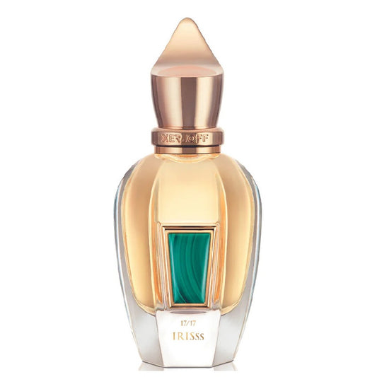 Gold and clear perfume bottle with green accent on a white background