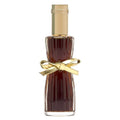 Perfume bottle with gold cap and bow on a white background