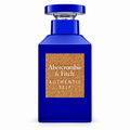 A cobalt blue rectangular perfume bottle with a cork-textured front label reading 'Abercrombie & Fitch AUTHENTIC SELF' on a white background.