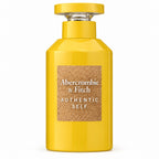 Bottle Image: Abercrombie & Fitch Authentic Self Woman 100ml Eau de Parfum bright-yellow sculptural bottle with matching cap and cork-effect front label on a clean white background