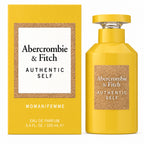 Pack Image: Abercrombie & Fitch Authentic Self Woman 100ml Eau de Parfum yellow bottle beside its matching yellow presentation box with white branding panel and cork-effect border on a clean white background