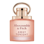 Abercrombie & Fitch Away Tonight perfume bottle in a soft peach-pink glass with a metallic rose gold cap and handle, shown on a plain white background.