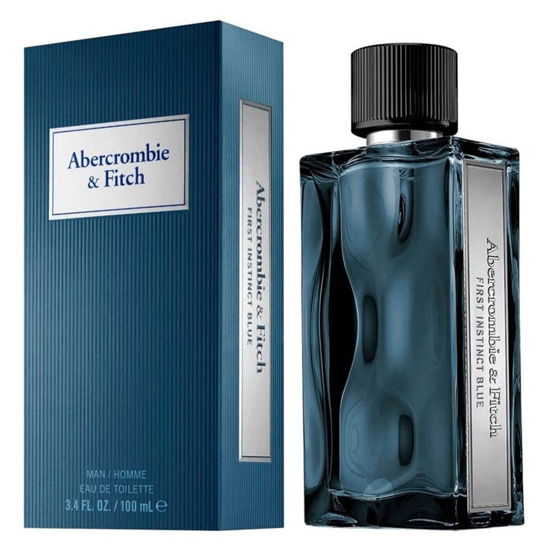 Abercrombie & Fitch First Instinct Blue Eau de Toilette shown with its blue ribbed box and the glass fragrance bottle on a white background.