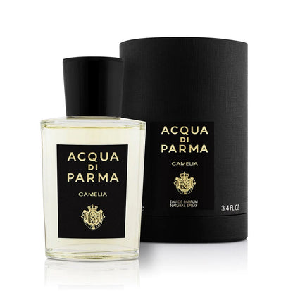Image of Acqua Di Parma Camelia Perfume bottle next to Black tube Packaging on a white background