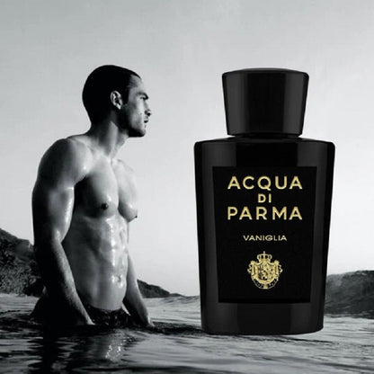 Picture of Vaniglia perfume bottle with man standing in the sea