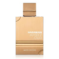 A bottle of Amber Oud White Edition eau de parfum by Al Haramain with a gold and white label on a white background.