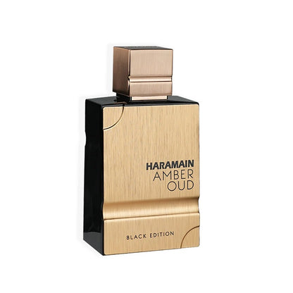 A bottle of Al Haramain Amber Oud Black Edition eau de parfum with a black and gold color scheme.
