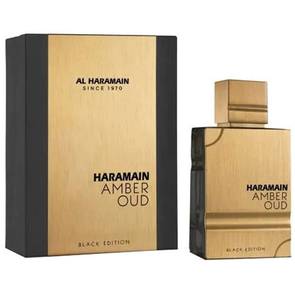 A product image featuring Al Haramain Amber Oud Black Edition Eau de Parfum in a gold-colored bottle with a black cap, alongside its packaging box with branding and product name.