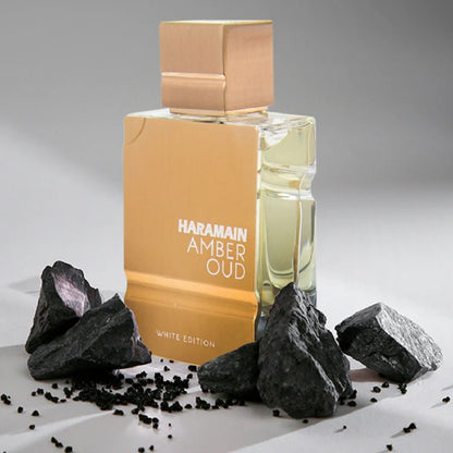 Al Haramain Amber Oud White Edition 60 ml bottle beside retail box packaging