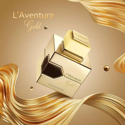 Gold perfume bottle with 'L'Aventure Gold' text on a gold background