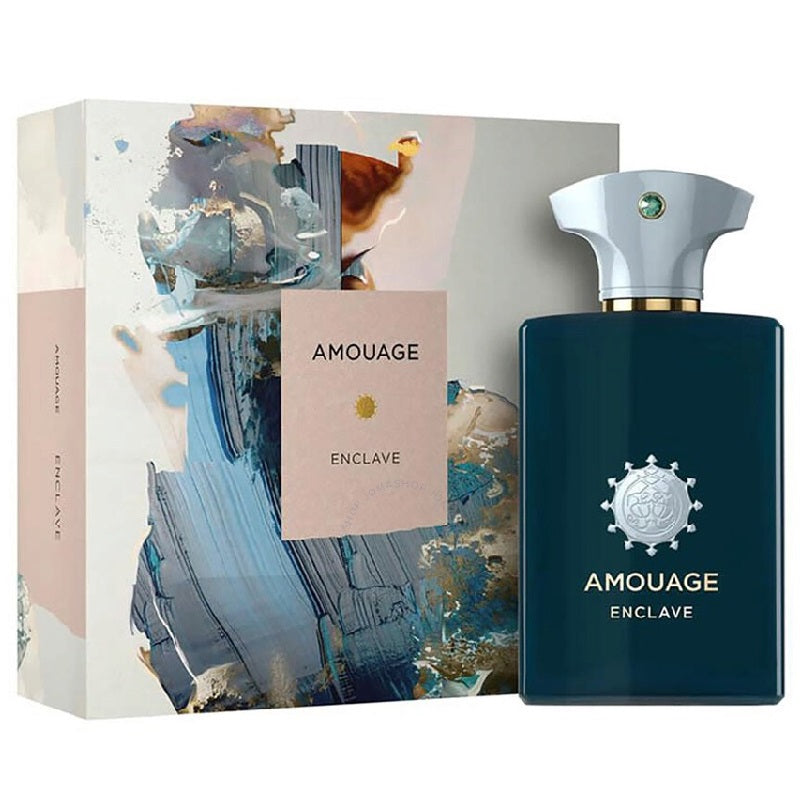A product image featuring a bottle of Amouage Enclave Eau De Parfum with its packaging. The bottle is dark blue with a silver cap, and the packaging has an artistic depiction of a natural scene.