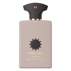 A bottle of Opus VII Reckless Leather eau de parfum by Amouage with a beige label and Black cap, featuring a logo and the scent name.
