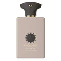 Amouage Opus XII Rose Incense perfume bottle, featuring a matte dusty pink rectangular body with a dark charcoal cap and gold lettering, set against a plain white background.