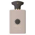 Amouage Opus XII Rose Incense perfume bottle, featuring a matte dusty pink rectangular body with a dark charcoal cap and gold lettering, set against a plain white background.
