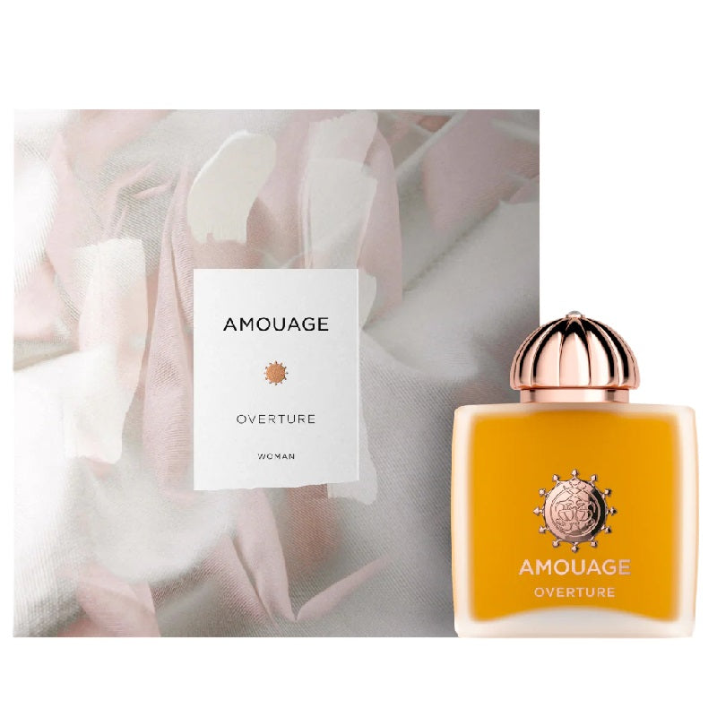 Amouage Overture perfume bottle and packaging with a soft floral background